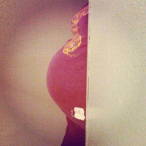 Ok so this isn't the 1st trimester- it's 36 weeks, but who wants to see a flat tummy 
